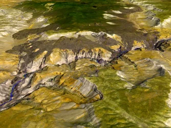 Satelliet thermische emissie en reflectie beeld van de Grand Canyon, Arizona, VS. Omdat verschillende mineralen verschillende delen van het lichtspectrum reflecteren, is de variërende mineraalsamenstelling zichtbaar.